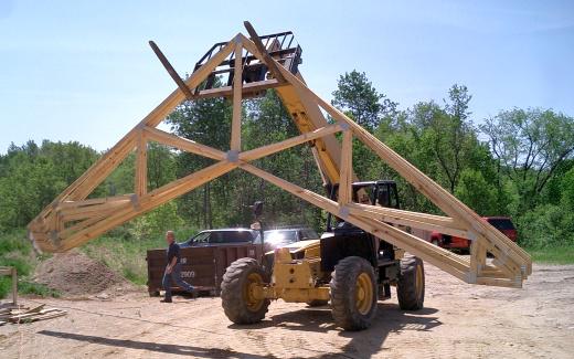 Matt in telehandler lifting next batch