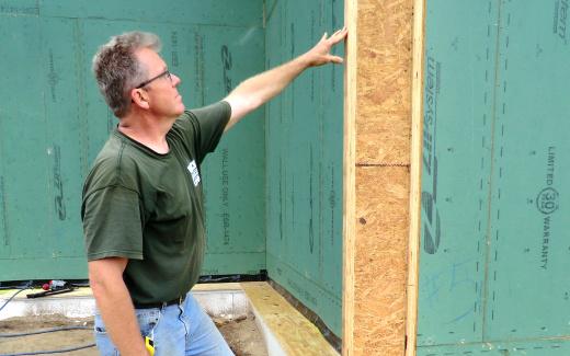 Michael demonstrating TJI truss placement