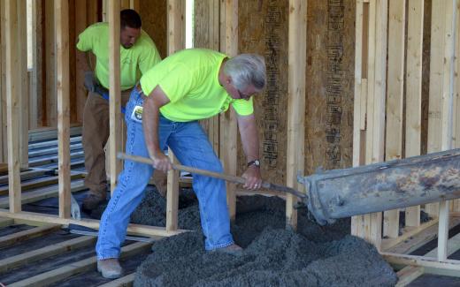 Jason and Mark working on first floor concrete