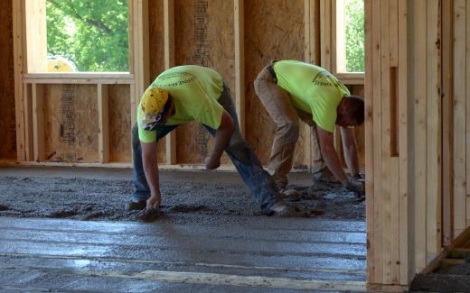 Bill and Jason working on first floor concrete