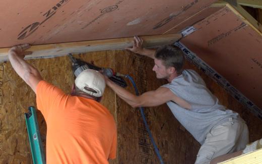 Bill and Matt installing air barrier framing