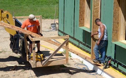 Bill and Thomas preparing to install vertical truss