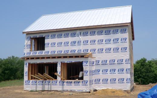 South face, with some windows covered