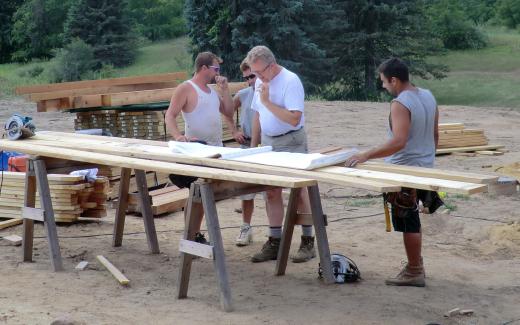 Team discussing porch construction