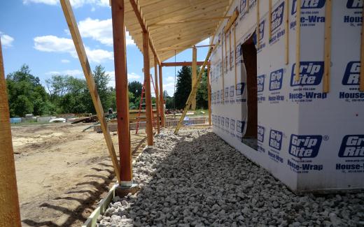 Gravel beneath porch