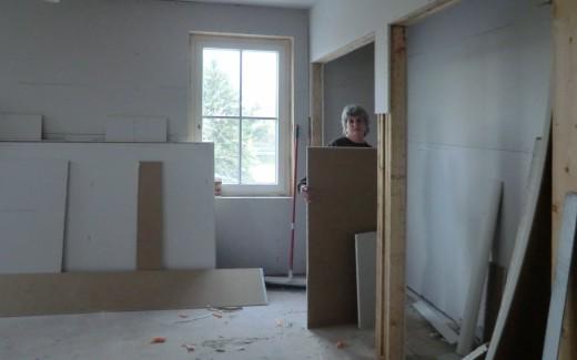 Friend Pat helping with drywall cleanup