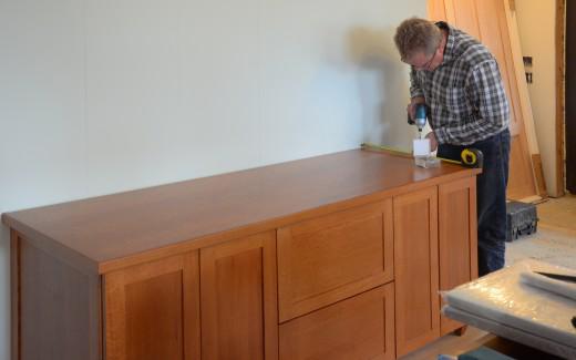 Michael working on kitchen pantry