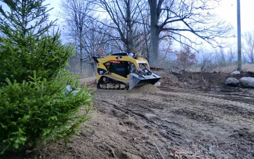 Driveway stone being placed