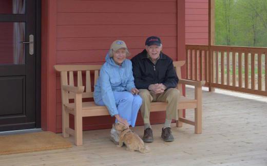 Nancy and Jerry Frost on bench Jerry made and gave to us